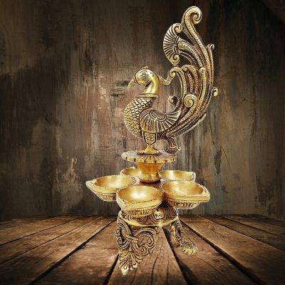 MohanJodero Brass Peacock Diya in Antique Golden finish